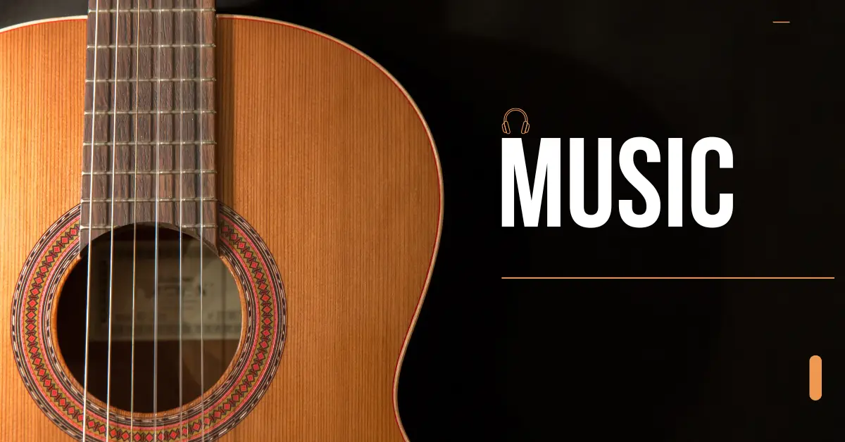 A guitar rests on a table, accompanied by the word "music" displayed prominently nearby.